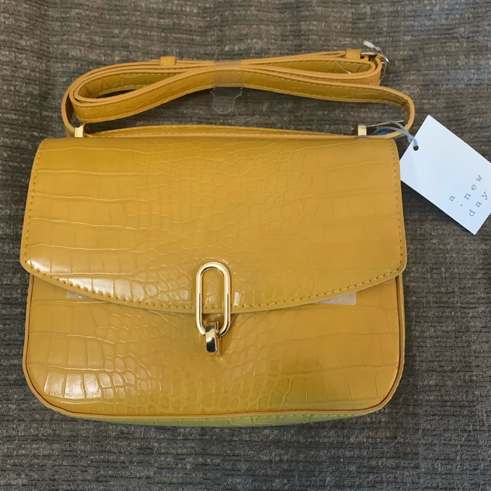 A New Day 
mustard purse